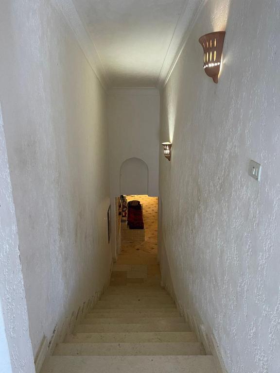Mynd úr myndasafni af فيلا عائلات فقط Families only - سيدى كرير Sidi Krir - خارج القرى السياحية Outside tourist villages- حديقة خاصة مستقله ومسبح خاص مشترك Private Garden-Shared Pool í Abû Zeira