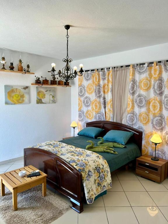 Postel nebo postele na pokoji v ubytování L'artisan