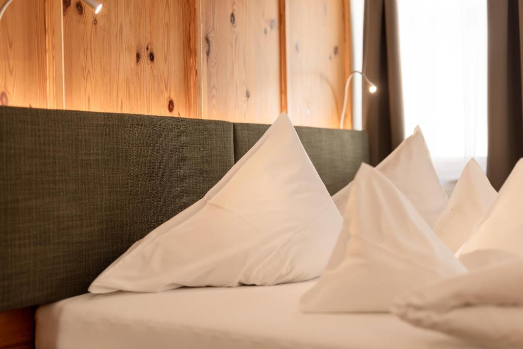Postel nebo postele na pokoji v ubytování Hotel Berghof