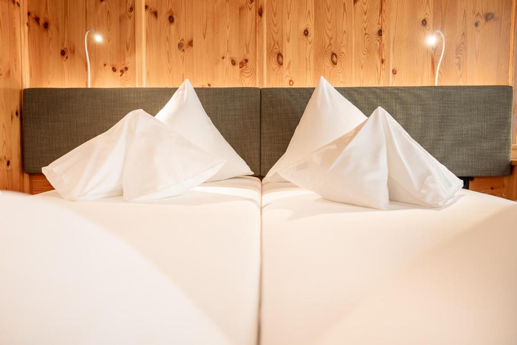 Postel nebo postele na pokoji v ubytování Hotel Berghof
