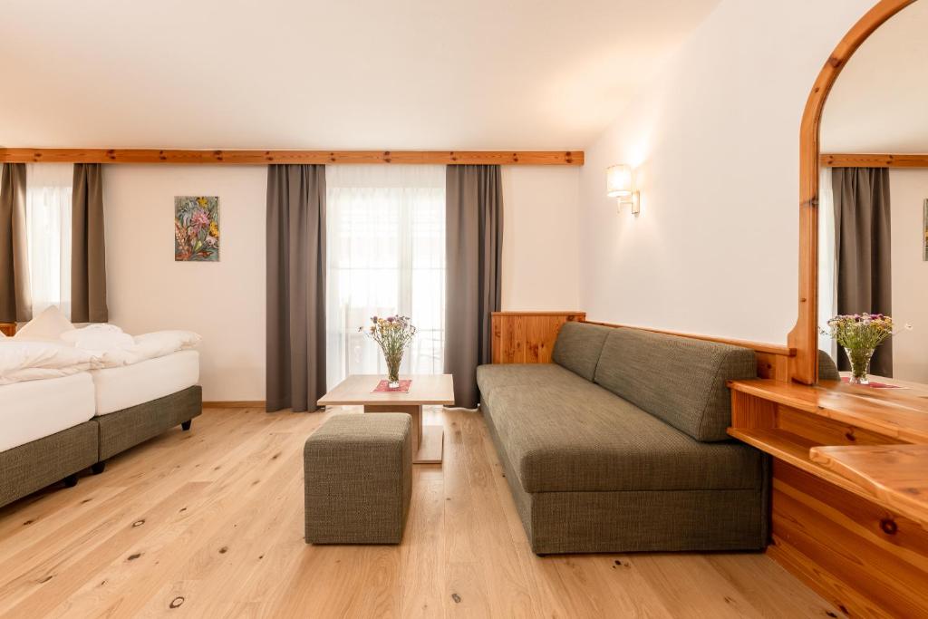 Postel nebo postele na pokoji v ubytování Hotel Berghof