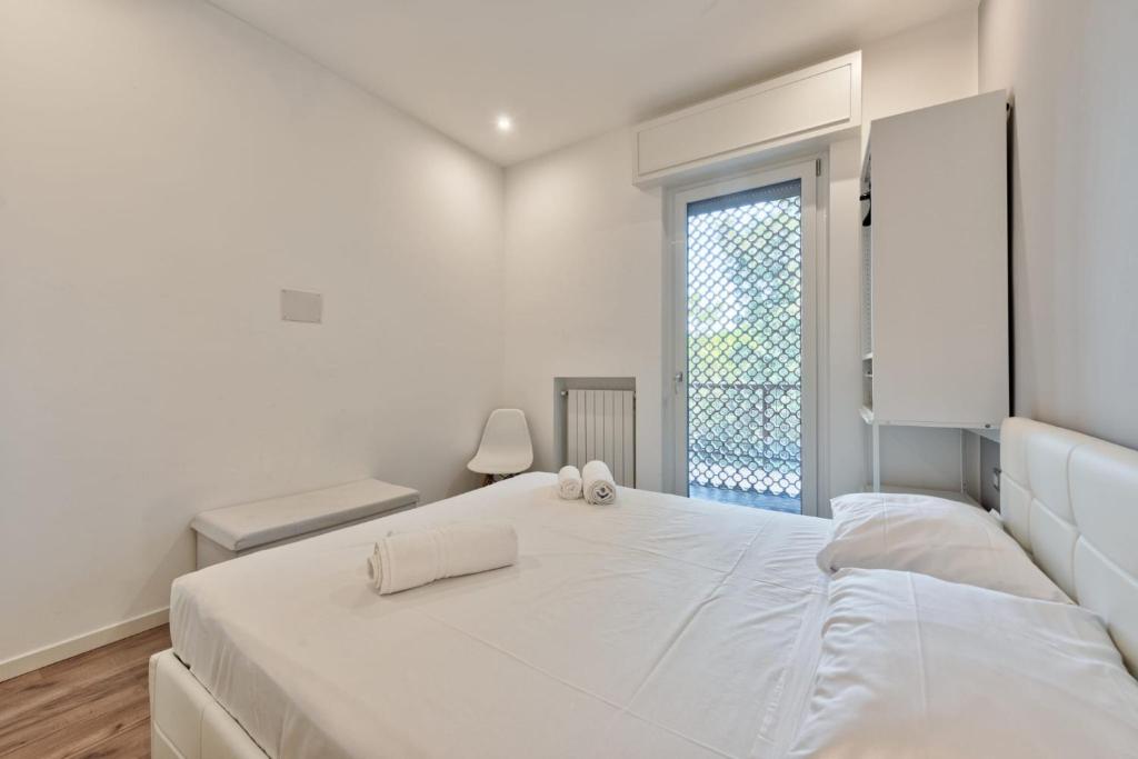 Postel nebo postele na pokoji v ubytování P1 Sweet Apartment Lake View&Pool