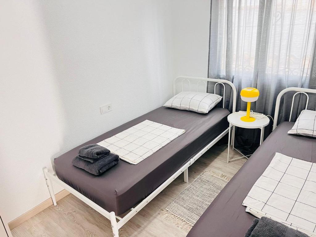 Postel nebo postele na pokoji v ubytování Townhouse Dreamhills Los Altos