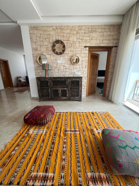 Postel nebo postele na pokoji v ubytování Riad Tammam