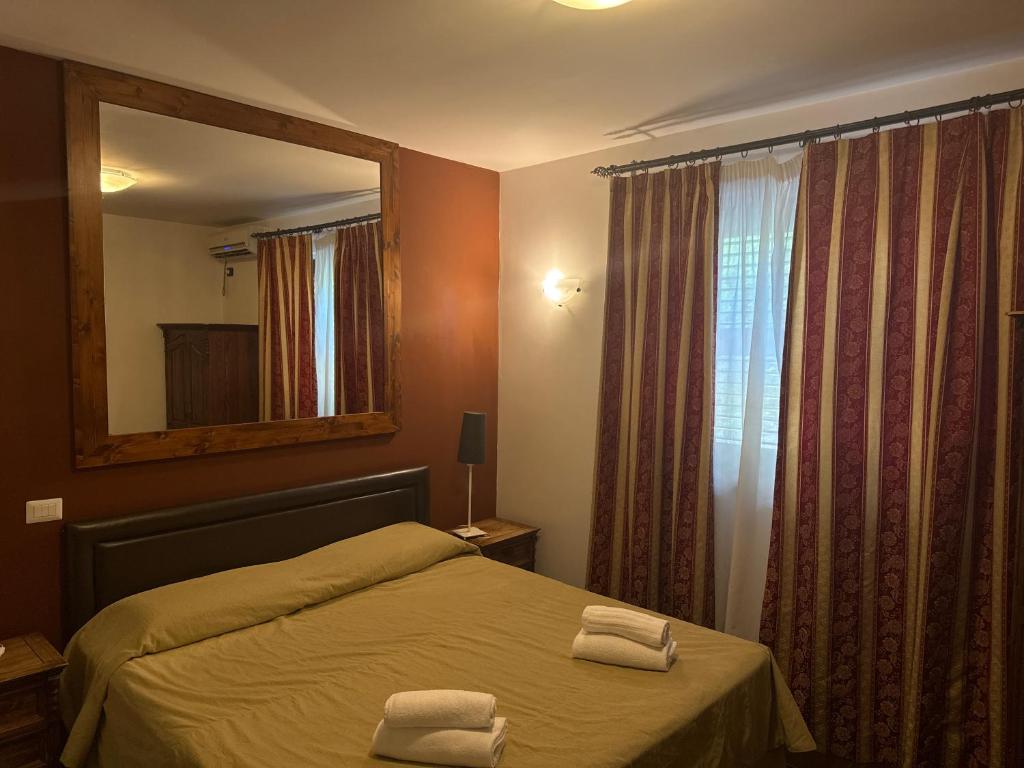 Postel nebo postele na pokoji v ubytování Park Hotel Serenissima