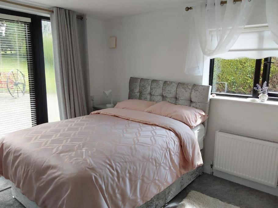 Postel nebo postele na pokoji v ubytování keeloges Lodge