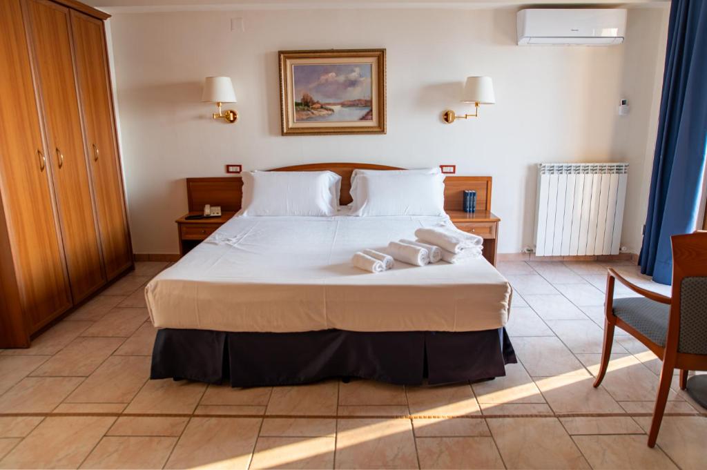 Postel nebo postele na pokoji v ubytování Hotel Bisanzio Resort