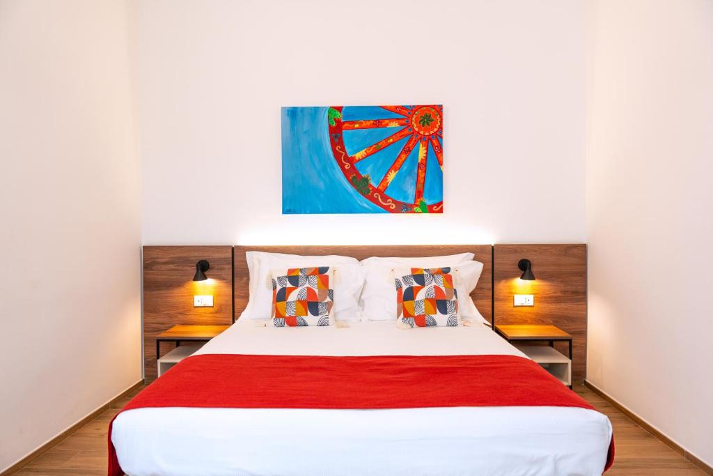 Кровать или кровати в номере Elaia Rooms