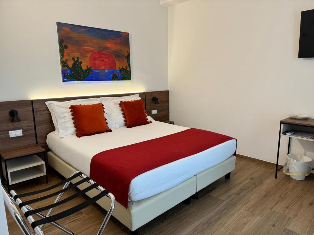 Кровать или кровати в номере Elaia Rooms