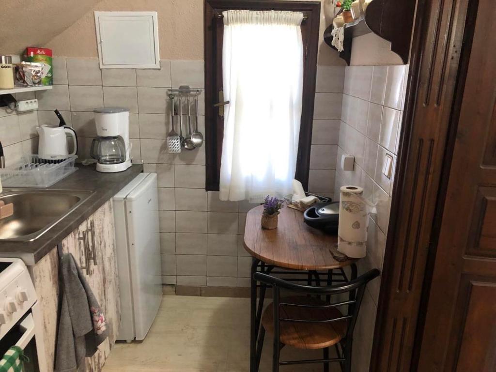 Kuchyň nebo kuchyňský kout v ubytování Talos House