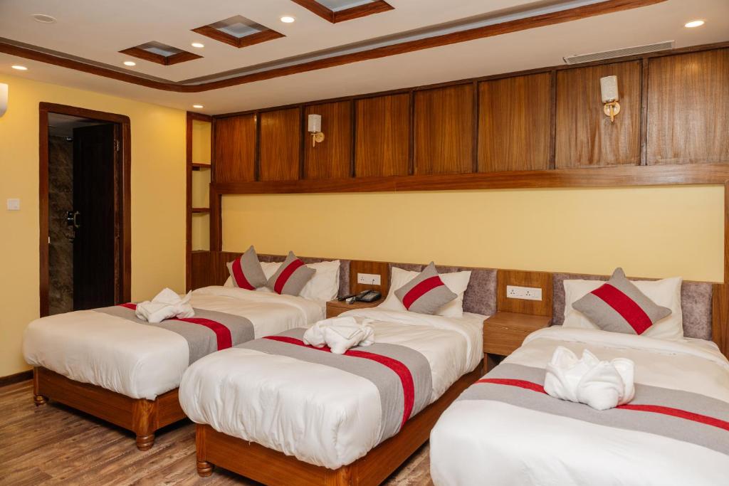 Postel nebo postele na pokoji v ubytování Hotel Royal Airport