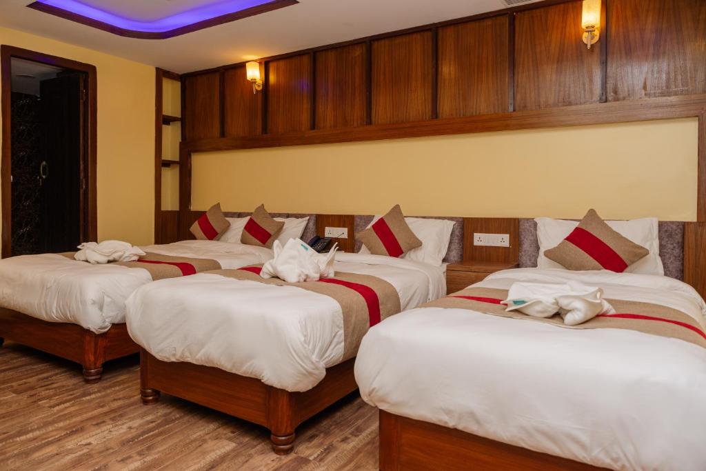 Postel nebo postele na pokoji v ubytování Hotel Royal Airport