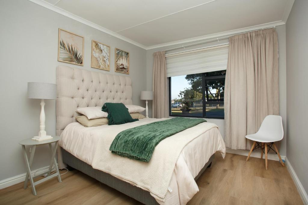 Ένα ή περισσότερα κρεβάτια σε δωμάτιο στο Hartsgeluk