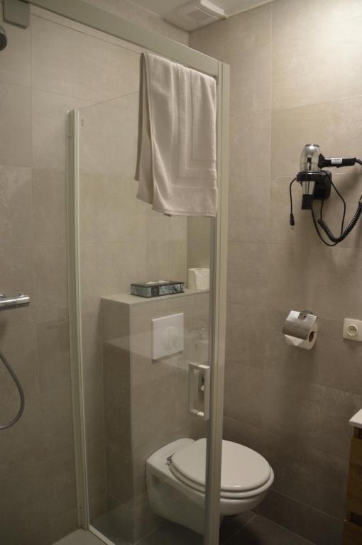 Koupelna v ubytování Hotel Mille Colonnes