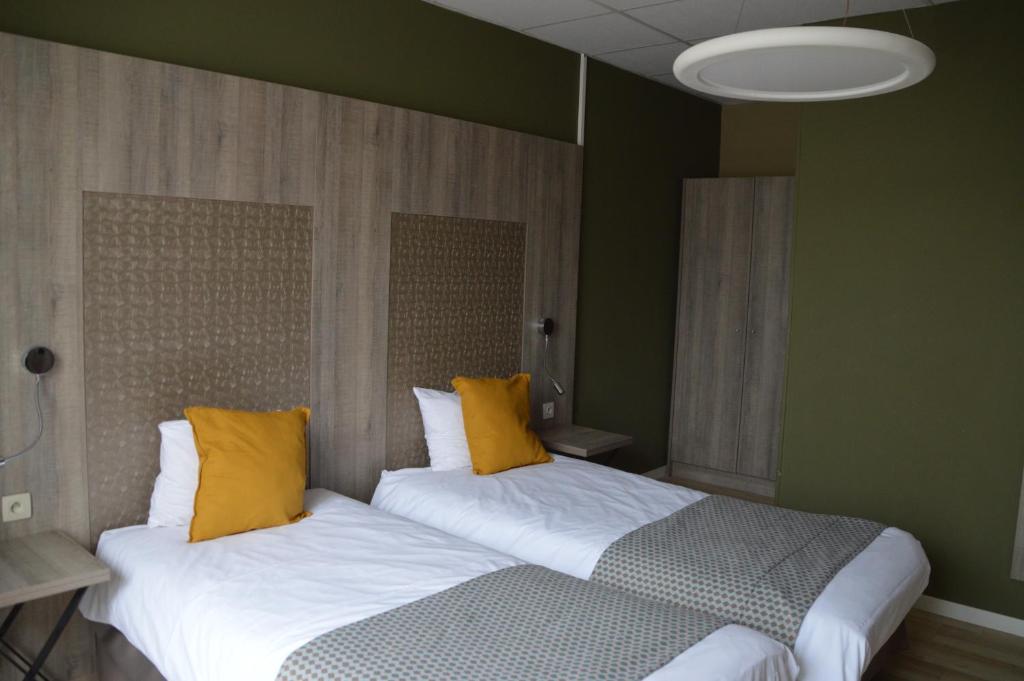 Postel nebo postele na pokoji v ubytování Hotel Mille Colonnes