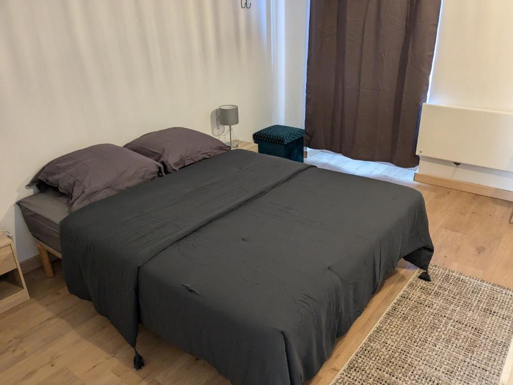 Letto o letti in una camera di Chez Cornélia