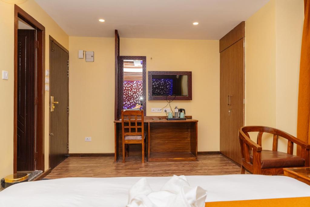 TV a/nebo společenská místnost v ubytování Hotel Royal Airport