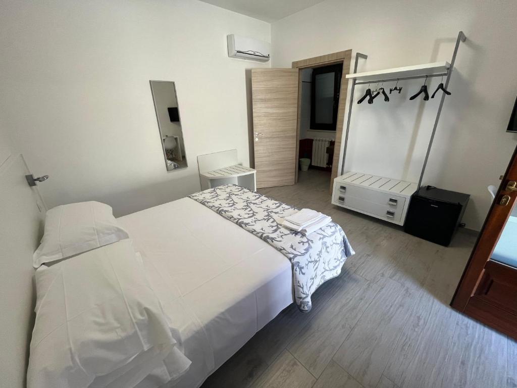 Postel nebo postele na pokoji v ubytování Al Centro Baia