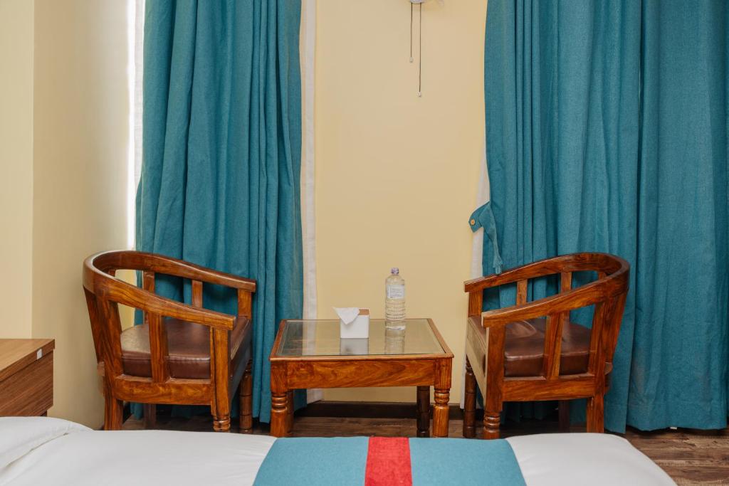 Postel nebo postele na pokoji v ubytování Hotel Royal Airport