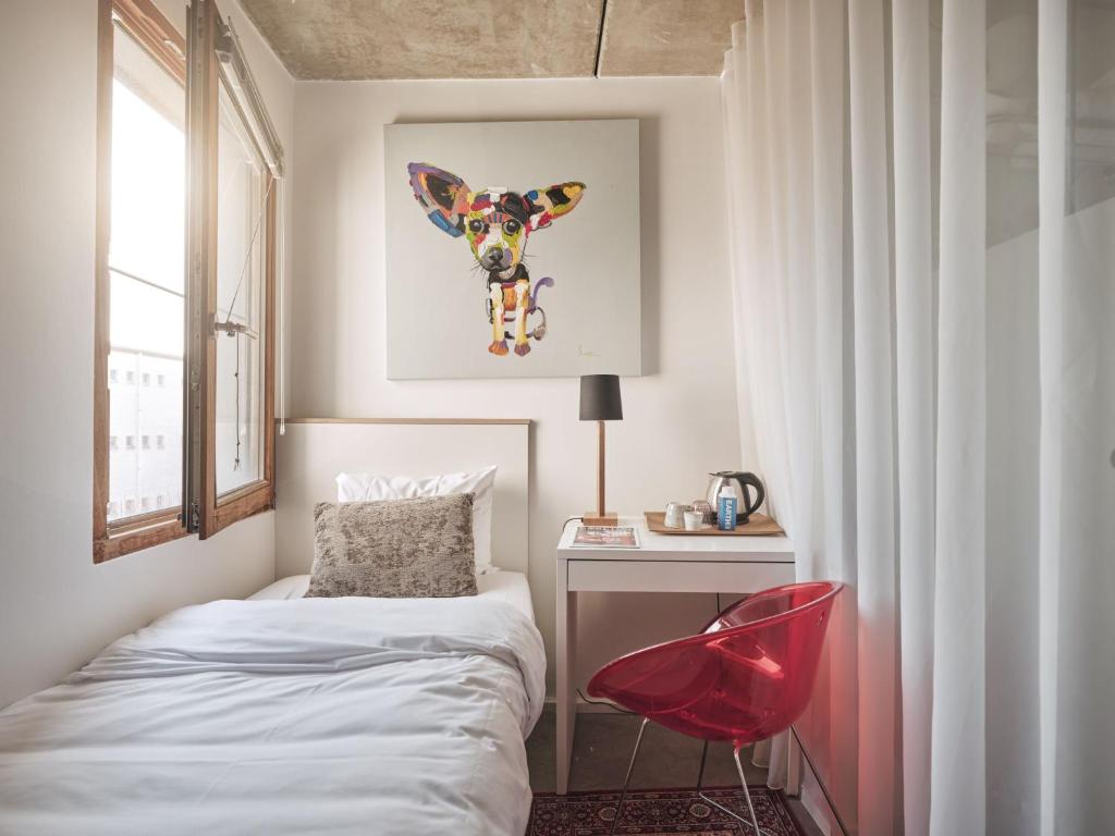 Uma cama ou camas num quarto em BANKS Antwerp