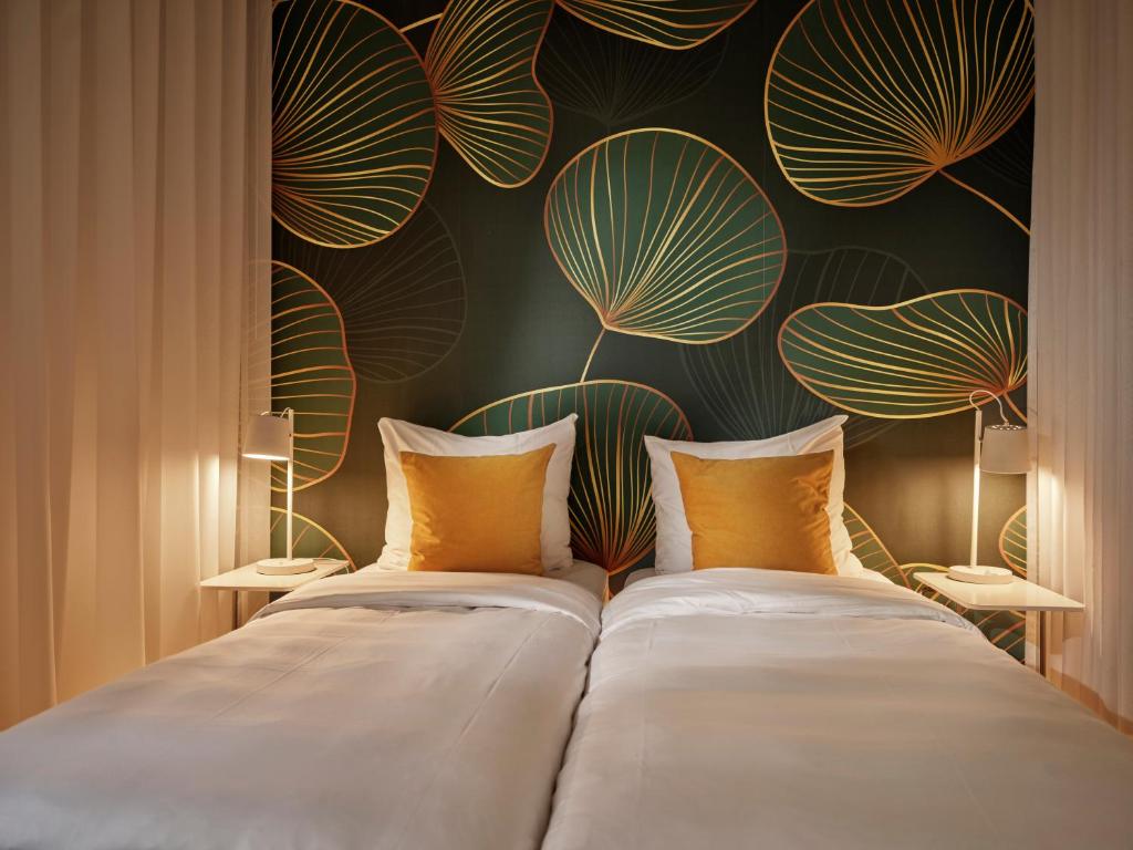 Uma cama ou camas num quarto em BANKS Antwerp