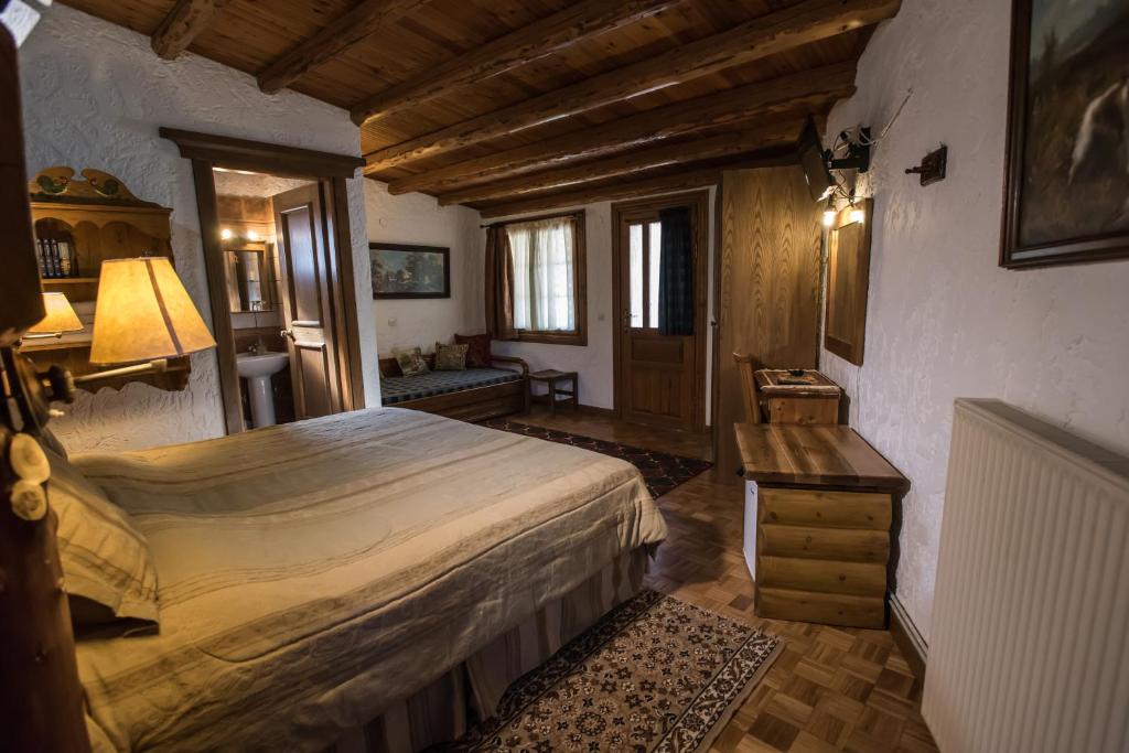 Postel nebo postele na pokoji v ubytování I Gonia Tis Linas
