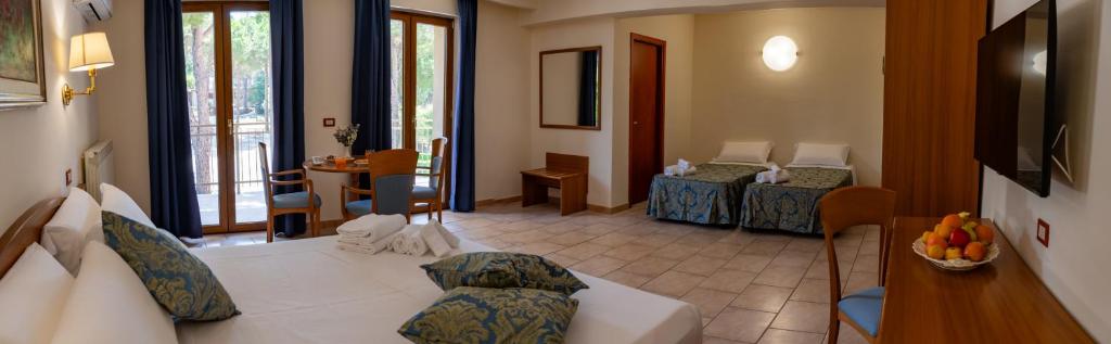 Postel nebo postele na pokoji v ubytování Hotel Bisanzio Resort