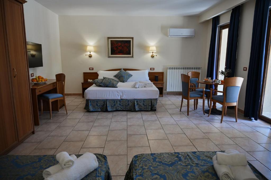 Postel nebo postele na pokoji v ubytování Hotel Bisanzio Resort
