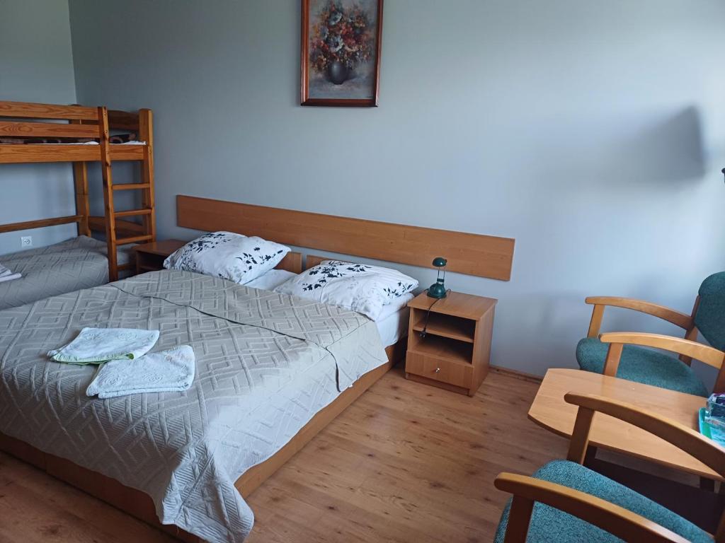 Posteľ alebo postele v izbe v ubytovaní Agroturystyka Zielony Ogród