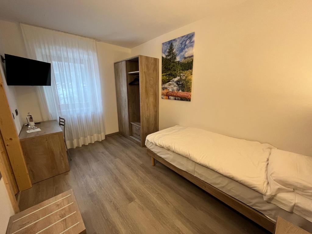 TV a/nebo společenská místnost v ubytování Hotel Zanella