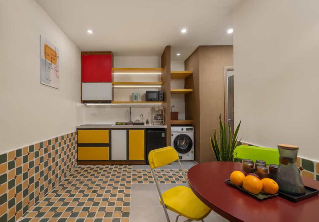 Kuchyň nebo kuchyňský kout v ubytování Q Apartment Da Nang