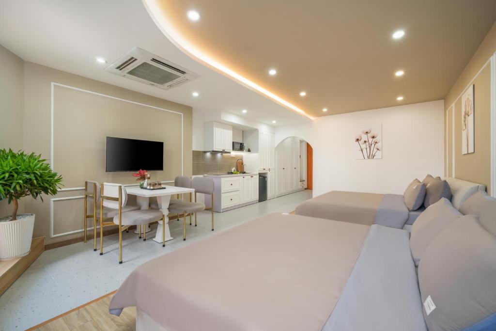 TV a/nebo společenská místnost v ubytování Q Apartment Da Nang