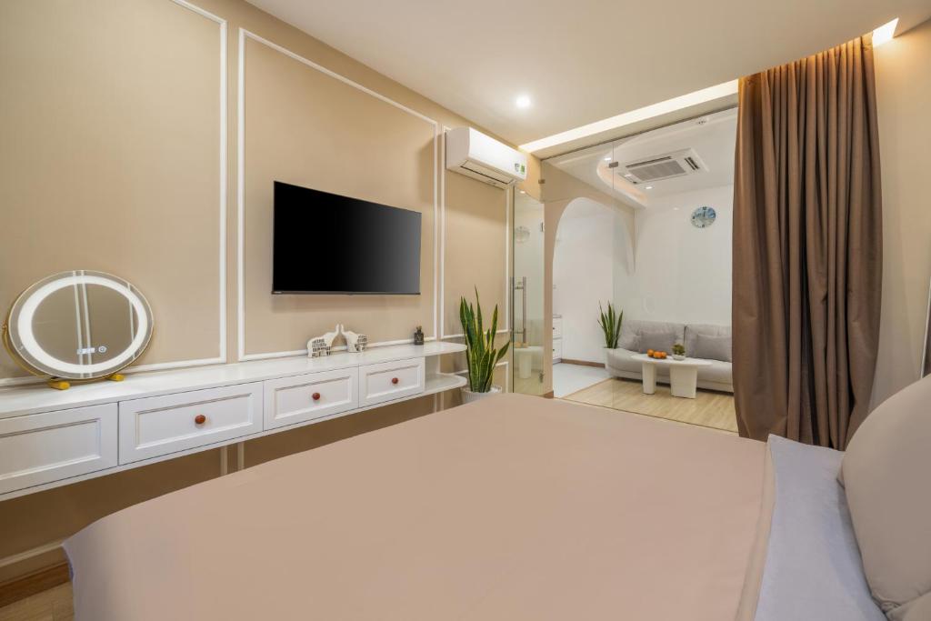 TV a/nebo společenská místnost v ubytování Q Apartment Da Nang