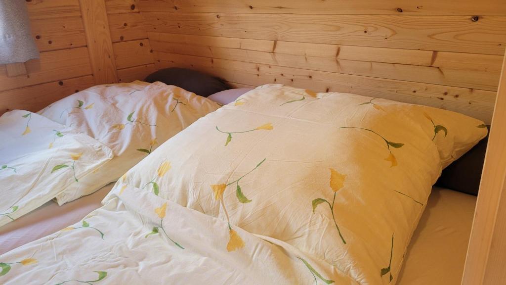 Postel nebo postele na pokoji v ubytování Schlaffass