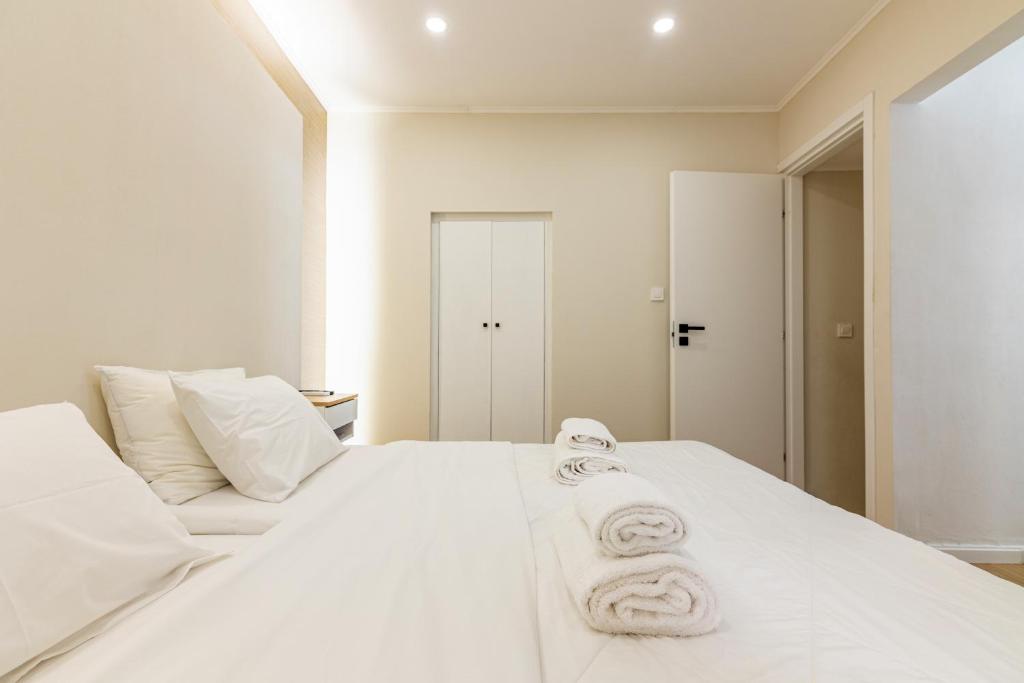A bed or beds in a room at Stef&Art Old Town House