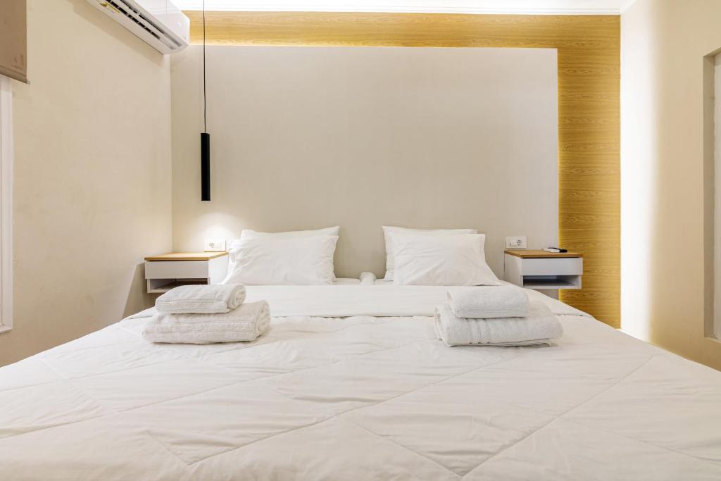 A bed or beds in a room at Stef&Art Old Town House