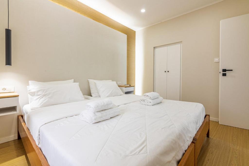 A bed or beds in a room at Stef&Art Old Town House