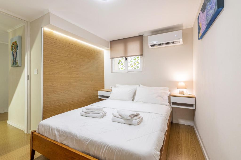 A bed or beds in a room at Stef&Art Old Town House