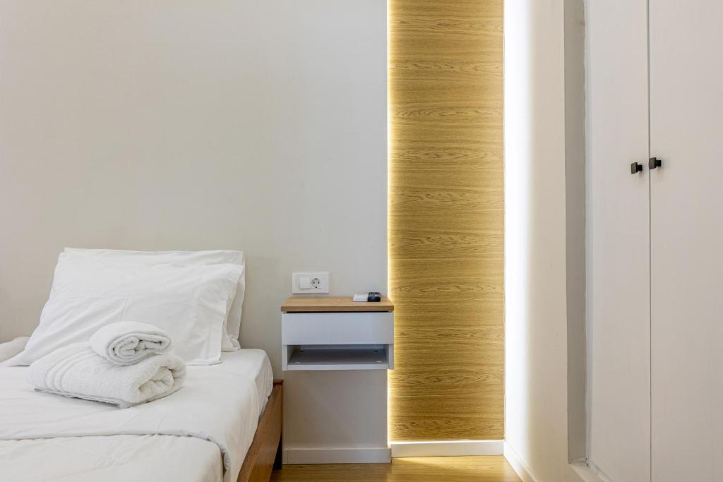 A bed or beds in a room at Stef&Art Old Town House