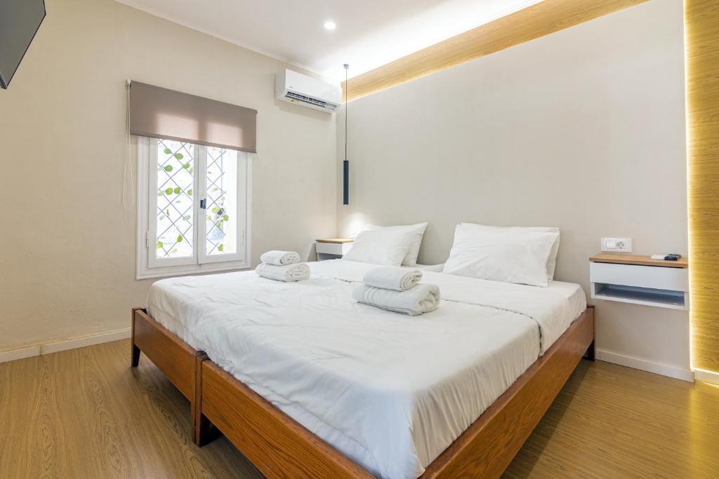 A bed or beds in a room at Stef&Art Old Town House