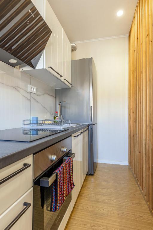 A kitchen or kitchenette at Stef&Art Old Town House