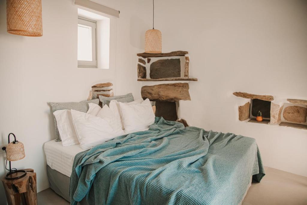Postel nebo postele na pokoji v ubytování Venue Villas - Folegandros