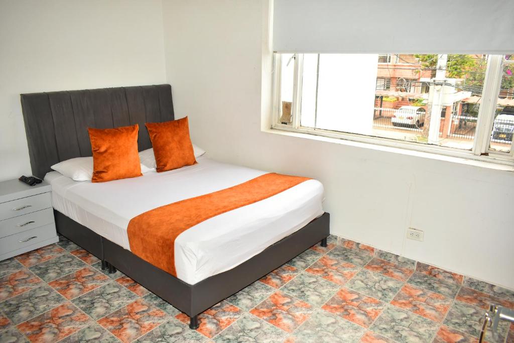 Postel nebo postele na pokoji v ubytování Hotel Flamante Bulevar
