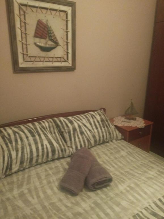 Postel nebo postele na pokoji v ubytování zoi apartment