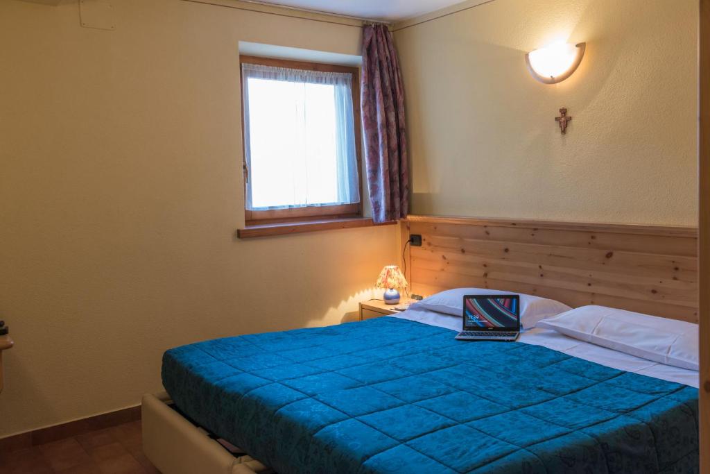 Postel nebo postele na pokoji v ubytování Appartamento Levanto