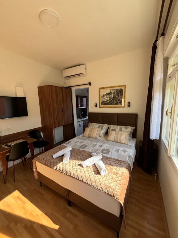 Postel nebo postele na pokoji v ubytování Apart AS