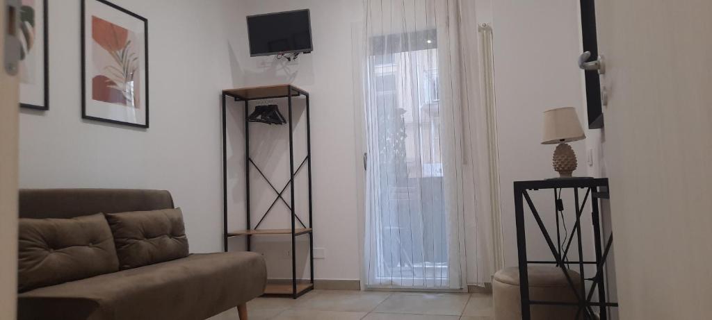 TV a/nebo společenská místnost v ubytování Efebo Rooms