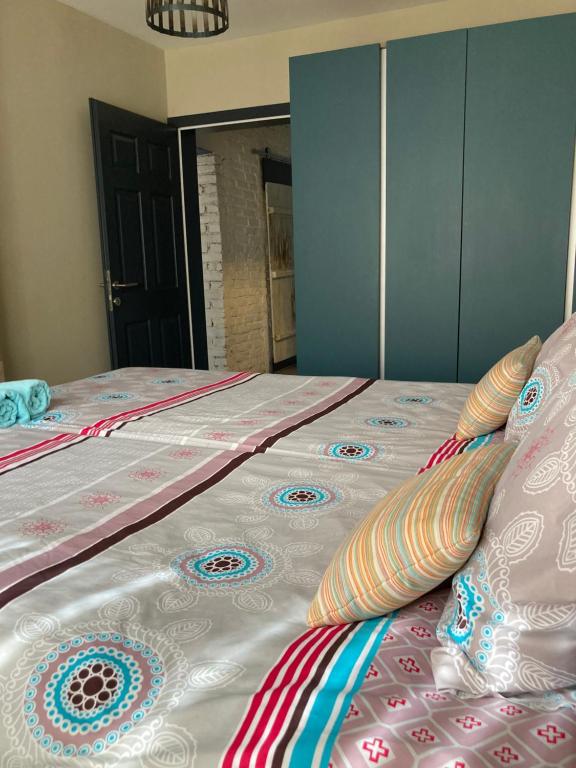 Ein Bett oder Betten in einem Zimmer der Unterkunft Mihajlovik LUX Apartment in Heart of SKOPJE