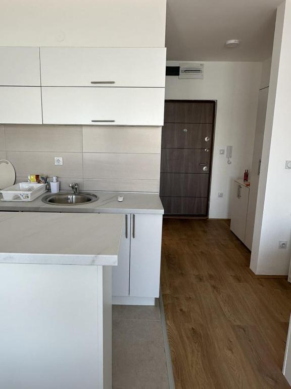 Kuchyň nebo kuchyňský kout v ubytování Apartmani Casper