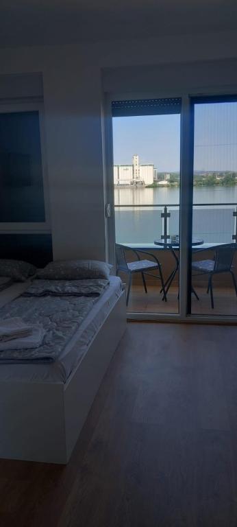 Postel nebo postele na pokoji v ubytování Apartmani Casper